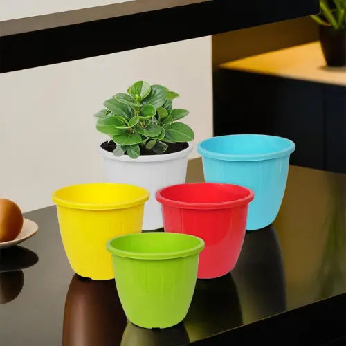 Durable lightweight plastic planter with drainage holes Durable lightweight plastic planter with drainage holes